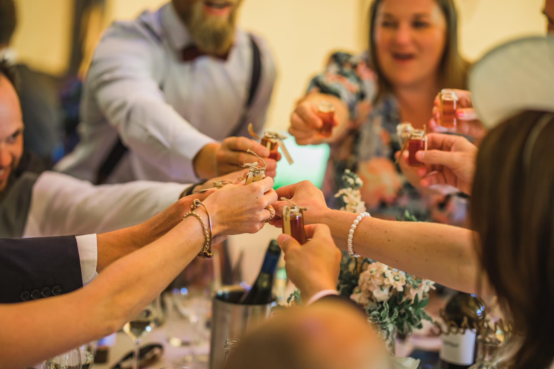 Guests toasting with wedding favours at a Sumner's Ponds reception
